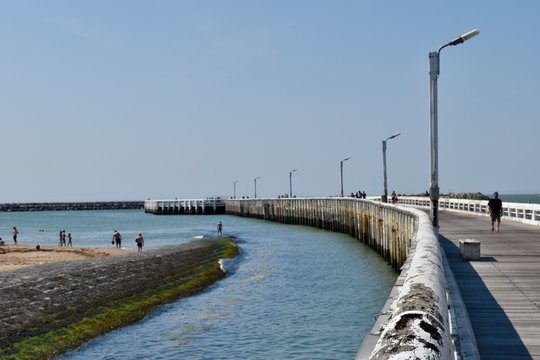 Ostende / Belgium - July 01 2018 : People are walking on the Ostende Pier