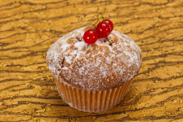 Sweet tasty muffin with red currants