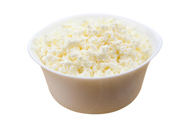 Tasty fresh grained cottage cheese on a plate on  White background