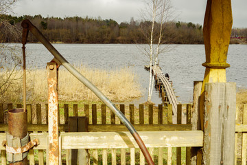 
village well on the banks of a large river