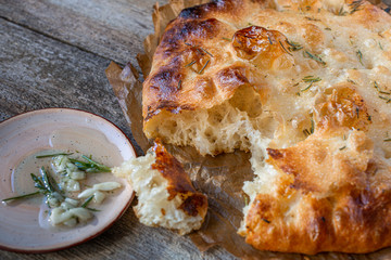 Appetizing, crispy, yeastless focaccia. Italian traditional bread. Made with natural bread sourdough