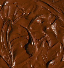 molten milk chocolate with wavy patterns
