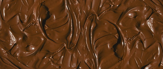 molten milk chocolate with wavy patterns