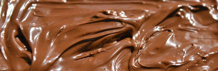 molten milk chocolate with wavy patterns