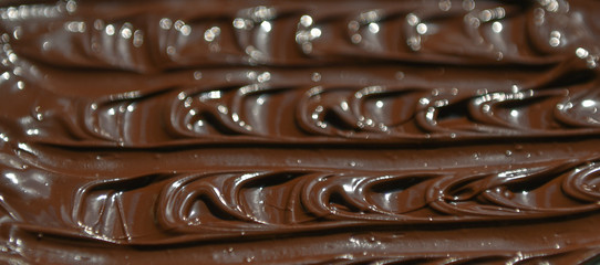 molten milk chocolate with wavy patterns