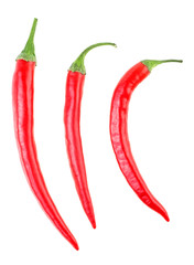 Red hot chili peppers isolated on a white background, top view.