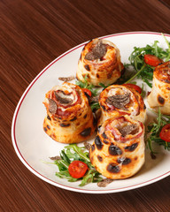 Pizza petals with Fior di latte, provolone, turkey ham, mushrooms, bresaola, truffle cream and seasonal fresh truffle. Italian cuisine. Wooden background