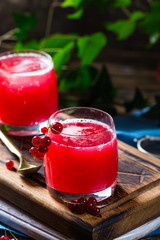 Homemade fermented raw kombucha tea with different flavorings. Healthy natural probiotic flavored drink. Russian drink kvass. Fermentation drink. Organic drink. Sider. Red currant