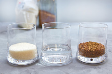 Step 1. Composition and proportions for making Dalgona coffee. Coffee, sugar and water in a ratio of 1:1:1