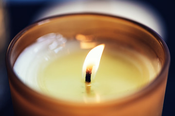 Closeup of lit candle