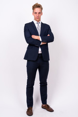 Young handsome Scandinavian businessman against white background