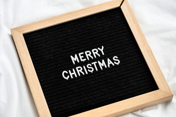 Seasonal greetings in a black board © rawpixel.com