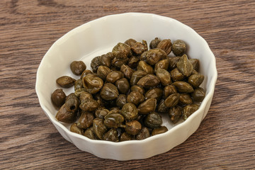 Tasty capers in the bowl