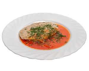 Schnitzel with gravy on a white background