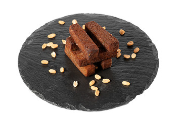 black bread croutons on a white background
