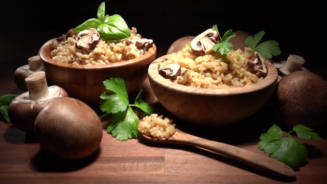risotto with mushrooms, fresh herbs and cuisine parmesan cheese.