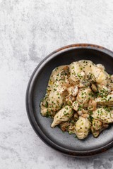 Dumplings with rabbit meat. Rabbit pelmeni with truffle oil. Hiqh quality photo. Best for promotion. Marble table.  Close-up and top view. Flat lay