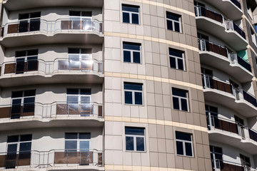 Fototapeta premium element of a modern building with metal paneled windows