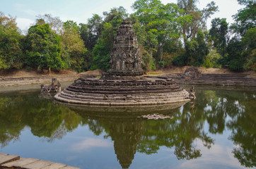 Fototapeta na wymiar Temple Neak Pean. Located on artificial circular island. Angkor - UNESCO World Heritage site. Cambodia, Siem Reap