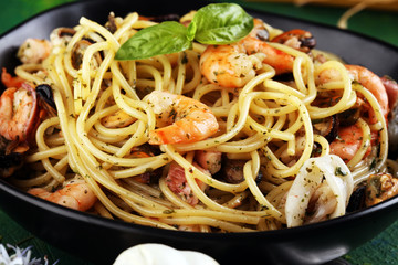 Seafood pasta. Dish with mediterranean frutti di mare on table
