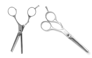 New thinning scissors on white background. Professional hairdresser tool