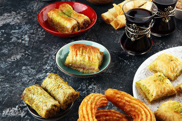 Middle eastern or arabic dishes. Turkish Dessert Baklava with pistachio. Halal food.