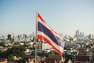 Thai flag and view to the city, Bangkok, Thailand