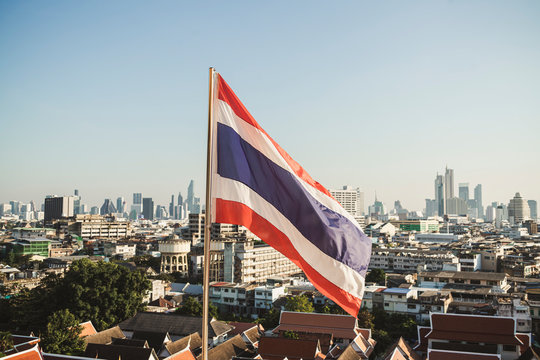 Thai flag and view to the city, Bangkok, Thailand
