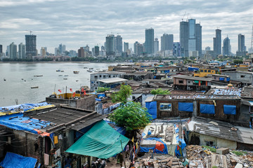 View of Mumbai skyline with skyscrapers over slums in Bandra suburb. Mumbai, Maharashtra, India - 341081812
