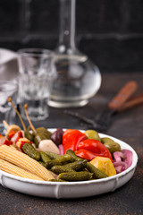 Assortment of marinated or pickled vegetable.