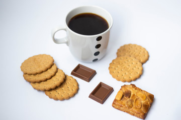 coffee, cookies and chocolate on a white background