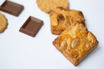 cookies and chocolate on a white background