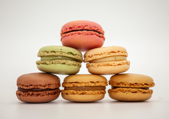 colorful macaroons on a wooden table