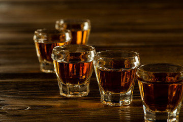 glasses with brandy on the table, strong alcoholic drinks