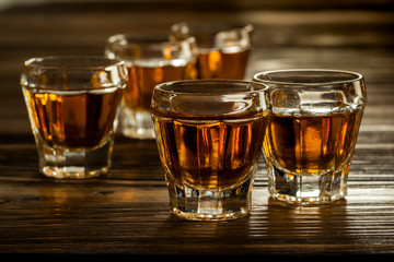 glasses with brandy on the table, strong alcoholic drinks
