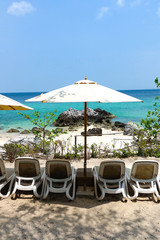 Sunbed on a tropical beach.      