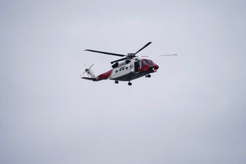 Fototapeta na wymiar Scottish coastguard helicopter in air