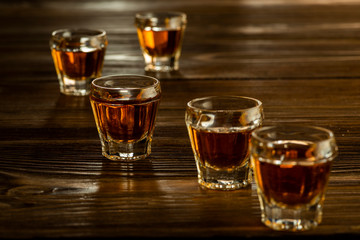 glasses with brandy on the table, strong alcoholic drinks