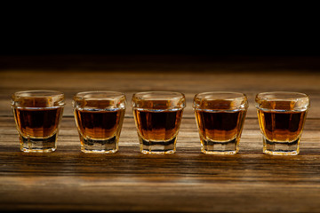 strong alcoholic drinks in glasses on the table, alcoholic beverages drinks