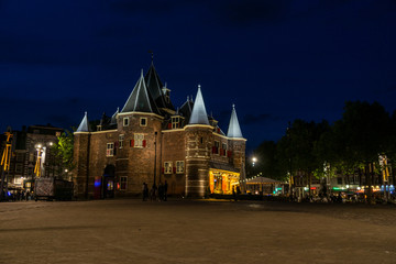 cute fairytale castle in the square in the night
