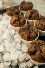 home-made muffins in ceramic molds with ice cooling