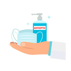 The pharmacist is holding a medical mask and hand antiseptic in his hand. Online pharmacy concept during the world coronavirus pandemic.