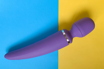Sex toy. Massager for sex on a color background. Sex gadget and masturbation device. Useful for...