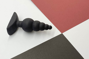 Sex toy. Black butt plag. Adult shop assortment