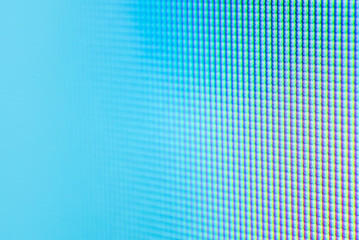 Macro of television pixels with blue dominants and bokeh