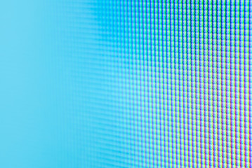 Fototapeta premium Macro of television pixels with blue dominants and bokeh