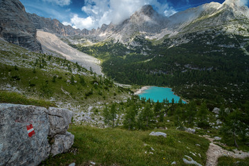Naklejka na ściany i meble Beautiful Turquoise Lago di Sorapis Lake with Dolomites Mountains, Italy