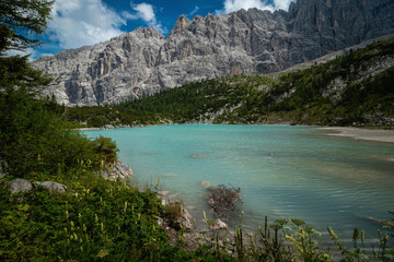 Naklejka na ściany i meble Beautiful Turquoise Lago di Sorapis Lake with Dolomites Mountains, Italy