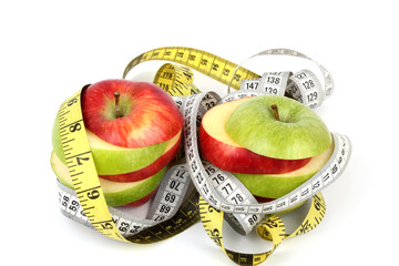 sliced red and green apple on white ground 