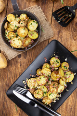 Fresh made Fried Potatoes (selective focus; close-up)